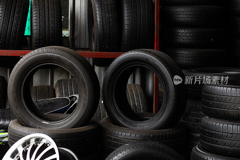 Satck of car tires texrture background  in automobile store